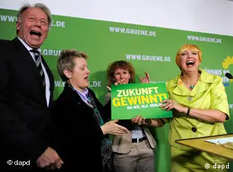 Green party leaders celebrate after the election