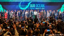 Family picture taken on the opening day of the Our Ocean Conference at the Panama Convention Centre in Panama City on March 2, 2023. - Leaders gather in Panama to discuss the world's oceans and the multiple threats they face, from climate change and pollution to overfishing and mining. About 600 government officials, businesspeople, environmental activists and academics are expected to rub shoulders at the two-day Our Ocean conference in the Central American country. (Photo by Luis ACOSTA / AFP)