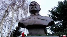 A picture shows the newly unveiled bronze bust of Soviet leader Joseph Stalin outside the museum dedicated to the Battle of Stalingrad in the southern Russian city of Volgograd on February 1, 2023, on the eve of commemorations of the Soviet victory in the Stalingrad battle. (Photo by STRINGER / AFP)