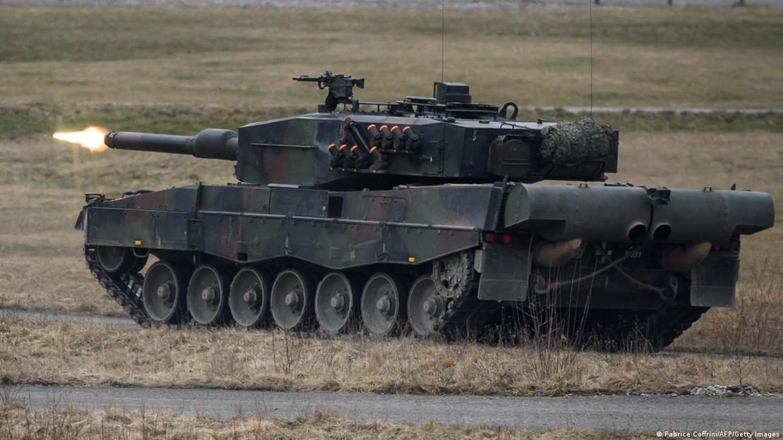 A Leopard 2 tank fires a round during live-fire exercises in Switzerland