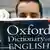 Mann mit einem "Oxford Dictionary of English" (Foto: dpa)