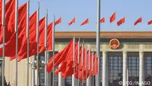 BEIJING, CHINA - MARCH 03: Chinese national flags flutter in front of the Great Hall of the People ahead of the annual two sessions on March 3, 2023 in Beijing, China. The first session of the 14th National People s Congress NPC is scheduled to open on March 5, and the first session of the 14th National Committee of the Chinese People s Political Consultative Conference CPPCC is set to begin on March 4. PUBLICATIONxINxGERxSUIxAUTxHUNxONLY Copyright: xVCGx VCG111425271028