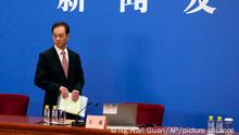 Spokesperson Wang Chao arrives for a press conference on the eve of the opening session of the annual meeting of China's National People's Congress (NPC) at the Great Hall of the People in Beijing, Saturday, March 4, 2023. (AP Photo/Ng Han Guan)