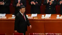 China's President Xi Jinping is applauded as he arrives for the opening session of the National People's Congress (NPC) at the Great Hall of the People in Beijing on March 5, 2023. (Photo by NOEL CELIS / AFP) (Photo by NOEL CELIS/AFP via Getty Images)
