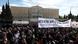 People gather during a protest outside the Greek parliament, in Athens People gather during a protest outside the Greek parliament, in Athens