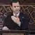بشار اسد به هنگام ایراد نطق در ۳۰ مارس در برابر مجلس سوریه