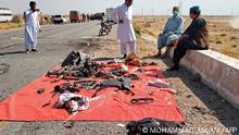 6.3.2023, Kachhi, Pakistan, Security officials examine the site after a suicide attack on a police truck near Dhadar, the main town of Kachhi district, about 120 kms southeast of Quetta in Balochistan province on March 6, 2023. - A suicide bomber killed nine police officers and wounded 16 others on March 6 in an attack on their truck in southwestern Pakistan, officials said. (Photo by Mohammad ASLAM / AFP)