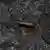Foto simbólica de un casquillo de bala sobre el asfalto en una imagen de archivo.