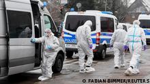 Forensic experts walk near a police vehicle outside a building housing a Kingdom Hall of Jehovah's Witnesses, where several people have been killed or seriously injured in a deadly shooting, in Hamburg, northern Germany, March 10, 2023. REUTERS/Fabian Bimmer
