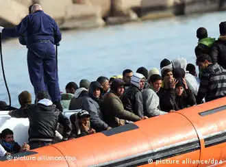 Immigrants being transported on a Coast Guard boat after arriving on Lampedusa