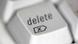A delete key on a keyboard A delete key on a keyboard