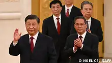 23.10.2023**(FILES) In this file photo taken on October 23, 2022, China's President Xi Jinping (L) walks with members of the Chinese Communist Party's new Politburo Standing Committee, the nation's top decision-making body, including Li Qiang (front R), as they meet the media in the Great Hall of the People in Beijing. - Li Qiang, one of Chinese president Xi Jinping's most trusted allies, was confirmed as Chinese premier on March 11, 2023, as Xi asserts his influence on the country's top leadership. (Photo by Noel CELIS / AFP)