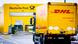 Lkw mit DHL-Logo vor einem Verteilzentrum der Deutschen Post DHL Lkw mit DHL-Logo vor einem Verteilzentrum der Deutschen Post DHL