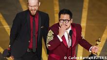 Daniel Kwan and Daniel Scheinert win the Oscar for Best Original Screenplay for Everything Everywhere All at Once during the Oscars show at the 95th Academy Awards in Hollywood, Los Angeles, California, U.S., March 12, 2023. REUTERS/Carlos Barria