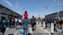 March 12, 2023**
Migrants, mostly of Venezuelan origin, attempt to forcibly cross into the United States at the Paso del Norte International Bridge in Ciudad Juarez, Chihuahua state, Mexico, on March 12, 2023. - Hundreds of migrants, mostly Venezuelans, attempted to stampede across one of the border bridges in the northern Mexican city of Ciudad Juarez, desperate to gain asylum in the United States. (Photo by HERIKA MARTINEZ / AFP) (Photo by HERIKA MARTINEZ/AFP via Getty Images)