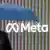 A man walks past the Meta logo carrying an umbrella
