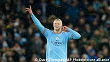 Manchester City's Erling Haaland celebrates after scoring the opening goal during the Champions League round of 16 second leg soccer match between Manchester City and RB Leipzig at the Etihad stadium in Manchester, England, Tuesday, March 14, 2023. (AP Photo/Dave Thompson)