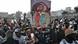 Supporters of Ousmane Sonko with poster of his Supporters of Ousmane Sonko with poster of his