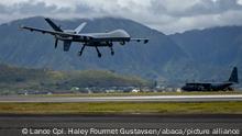 Handout photo dated July 6, 2022 shows a U.S. Air Force MQ-9 Reaper, assigned to the 49th Wing, lands at Marine Corps Air Station Kaneohe Bay, Hawaii, during Rim of the Pacific (RIMPAC) 2022. A Russian fighter jet forced down a US Air Force drone over the Black Sea on Tuesday after damaging the propeller of the American MQ-9 Reaper drone, according to the US Air Force. The Reaper drone and two SU-27 Flanker jets were operating over international waters over the Black Sea when one of the Russian jets intentionally flew in front of and dumped fuel in front of the unmanned drone, according to the official. One of the jets then damaged the propeller of the Reaper, which is mounted on the rear of the drone, the official said. The damage to the propeller forced the US to bring down the Reaper in international waters in the Black Sea. U.S. Marine Corps photo by Lance Cpl. Haley Fourmet Gustavsen via ABACAPRESS.COM