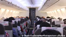 Passengers Can be seen in Srinagar-Delhi bound SpiceJet Airline (Photo by Nasir Kachroo/NurPhoto)