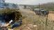 Migrants camp in Belarus at the point Brusgi on the border with Poland, which has recently been reinforced with barbed wire. 