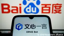 HANGZHOU, CHINA - MARCH 16, 2023 - Photo taken on March 16, 2023 shows ERNIE Bot and the logo of Baidu. Baidu's ERNIE Bot, known as China's version of ChatGPT, was officially launched on the same day. It is understood that ERNIE Bot is a new-generation AI large language model developed by Baidu, which has comprehensive capabilities in five usage scenarios: literary creation, commercial copy creation, mathematical calculation, Chinese understanding and multi-modal generation.