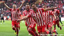19.03.2023
BERLIN, GERMANY - MARCH 19: Rani Khedira of 1.FC Union Berlin celebrates with teammates after scoring the team's first goal during the Bundesliga match between 1. FC Union Berlin and Eintracht Frankfurt at Stadion an der alten Foersterei on March 19, 2023 in Berlin, Germany. (Photo by Maja Hitij/Getty Images)
