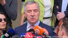 19.03.2023
Pro-Western incumbent Milo Djukanovic speaks to journalists after casting his ballot at the polling station in Montenegro's capital Podgorica, Sunday, March 19, 2023. Voters in Montenegro are casting ballots Sunday in a presidential election marked by political turmoil and uncertainty over whether the small NATO member state in the Balkans will unblock its bid to join the European Union or seek to improve ties with Serbia and Russia. (AP Photo/Risto Bozovic)