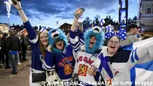 Finland ice hockey fans celebrate after their team won the final of the IIHF Ice Hockey World Championships final match between Finland and Canada in Tampere, Finland, on May 29, 2022. - - Finland OUT (Photo by Jussi Nukari / Lehtikuva / AFP) / Finland OUT (Photo by JUSSI NUKARI/Lehtikuva/AFP via Getty Images)
