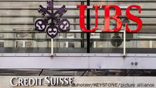 18/03/2023**Logos of the Swiss banks Credit Suisse and UBS are seen on two buildings in Zurich, Switzerland on Saturday, March 18, 2023. (KEYSTONE/Michael Buholzer).