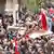 Thousands of mourners at a funeral in Syria