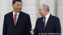TOPSHOT - Russian President Vladimir Putin meets with China's President Xi Jinping at the Kremlin in Moscow on March 21, 2023. (Photo by Sergei KARPUKHIN / SPUTNIK / AFP)