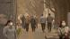 People wearing face masks walk along a street in the central business district in Beijing, Wednesday, March 22, 2023 People wearing face masks walk along a street in the central business district in Beijing, Wednesday, March 22, 2023
