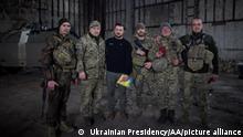 22.03.2023+++ BAKHMUT, UKRAINE - MARCH 22: (----EDITORIAL USE ONLY Äì MANDATORY CREDIT - 'UKRAINIAN PRESIDENCY / HANDOUT' - NO MARKETING NO ADVERTISING CAMPAIGNS - DISTRIBUTED AS A SERVICE TO CLIENTS----) Ukrainian President Volodymyr Zelenskyy (3rd L) poses for a photo with Ukrainian soldiers during his visit to Bakhmut frontline Russia-Ukraine war in Donetsk region, Bakhmut, Ukraine on March 22, 2023. Ukrainian Presidency / Handout / Anadolu Agency