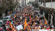 Protesters march during a rally in Bayonne, southwestern France, Thursday, march 23, 2023. French unions are holding their first mass demonstrations Thursday since President Emmanuel Macron enflamed public anger by forcing a higher retirement age through parliament without a vote. (AP Photo/Bob Edme)
