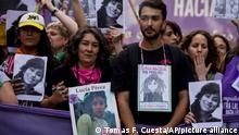 Marta Perez, front left, and Matias Perez, front right, the mother and brother of gender violence victim Lucia Perez, join a protest against gender violence in Buenos Aires, Argentina, Wednesday, Dec. 5, 2018. Argentine feminist groups and labor unions are protesting a court ruling that acquitted two men accused of sexually abusing and killing a 16-year-old girl. (AP Photo/Tomas F. Cuesta)