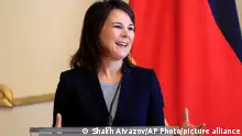 Germany's Foreign Minister Annalena Baerbock speaks during a joint news conference with Georgian Foreign Minister Ilia Darchiashvili in Tbilisi, Georgia, Friday, March 24, 2023. (AP Photo/Shakh Aivazov)