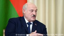 17/02/2023 FILE PHOTO: Belarusian President Alexander Lukashenko speaks to Russian President Vladimir Putin during a meeting at the Novo-Ogaryovo state residence outside Moscow, Russia February 17, 2023. Sputnik/Vladimir Astapkovich/Kremlin via REUTERS ATTENTION EDITORS - THIS IMAGE WAS PROVIDED BY A THIRD PARTY./File Photo