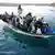 Ein Boot mit Flüchtlingen erreicht Lampedusa (Foto: dpa)