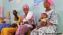 Mütter mit Kindern in einem Krankenhaus in Ghana
Still aus einem DW-Beitrag vom vom 23.3.23 