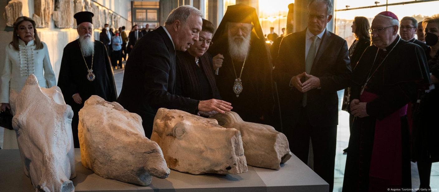 Acropolis Museum Director Nikolaos Stampolidis (L) speaks to Greek Culture Minister Lina Mendoni (second from the left), Greece's Orthodox Church Archbishop Ieronymos (C) and Bishop Brian Farrell, a Vatican secretary for promoting Christian unity (first from the right), during a ceremony at the Acropolis Museum in Athens on March 24, 2023.