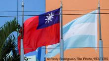 FILE PHOTO: The flags of Taiwan and Honduras flutter in the wind outside the Taiwan Embassy in Tegucigalpa, Honduras March 15, 2023. REUTERS/Fredy Rodriguez/File Photo