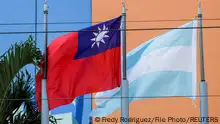 FILE PHOTO: The flags of Taiwan and Honduras flutter in the wind outside the Taiwan Embassy in Tegucigalpa, Honduras March 15, 2023. REUTERS/Fredy Rodriguez/File Photo