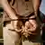 Handcuffs on a man arrested in South Africa