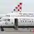 Dos aviones en los que se lee "Croatia" y un tercero con los colores nacionales en la cola, en el Aeropuerto Internacional de Zagreb en mayo de 2020.