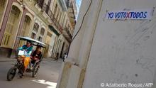 A banner asking Cubans to vote in the legislative elections next Sunday hangs on a wall in Havana on march 23, 2023. (Photo by ADALBERTO ROQUE / AFP) (Photo by ADALBERTO ROQUE/AFP via Getty Images)