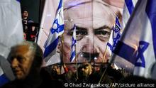 Israelis protest against plans by Prime Minister Benjamin Netanyahu's government to overhaul the Israel's judicial system, in Tel Aviv, Israel, Saturday, March 18, 2023. (AP Photo/Ohad Zwigenberg)