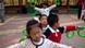 Children dance during their daily afternoon exercise at a kindergarten in Beijing, China, Thursday, April 28, 2011. A national census carried out late last year showed a sharp drop in the number of young people in China, with those under age 14 now accounting for 16.6 percent of the country's 1.34 billion people, down 6.3 percentage points from 2000. (AP Photo/Alexander F. Yuan) Children dance during their daily afternoon exercise at a kindergarten in Beijing, China, Thursday, April 28, 2011. A national census carried out late last year showed a sharp drop in the number of young people in China, with those under age 14 now accounting for 16.6 percent of the country's 1.34 billion people, down 6.3 percentage points from 2000. (AP Photo/Alexander F. Yuan)