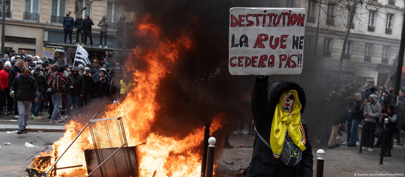 In Paris, Fire is set during the demonstration after the government pushed a pensions reform through parliament without a vote, using the article 49.3 of the constitution, in Paris on March 28, 2023.