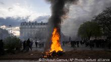 March 28, 2023 A vehicle burns after a demonstration Tuesday, March 28, 2023 in Paris. It's the latest round of nationwide demonstrations and strikes against unpopular pension reforms and President Emmanuel Macron's push to raise France's legal retirement age from 62 to 64. (AP Photo/Thibault Camus)